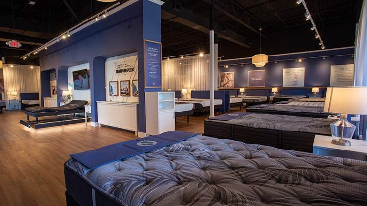 Cozy interior image of flagship mattress shopping experience.