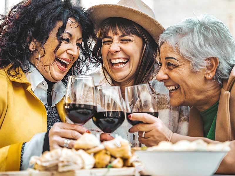 Women smiling and laughing together