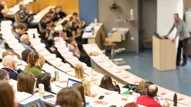 University auditorium classroom with students 
