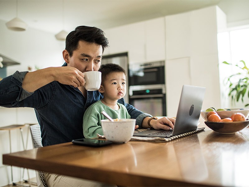 Man working from home with child