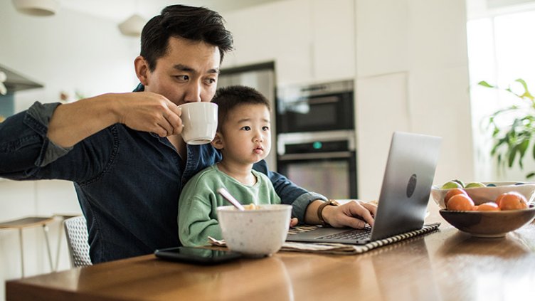 Man working from home with child