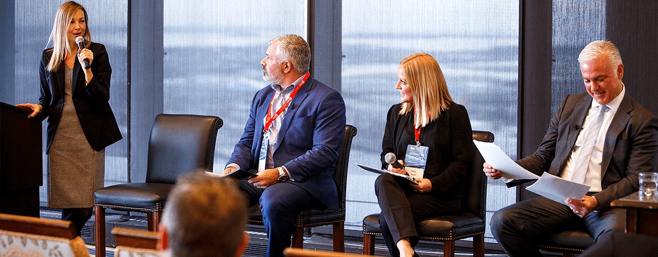 JLL New England Head of Research Julia Georgules, Boston Brokerage Lead Ben Heller, Cambridge Brokerage Managing Director Molly Heath and Capital Markets Lead Frank Petz taking part in a panel discussion focused on why Boston.