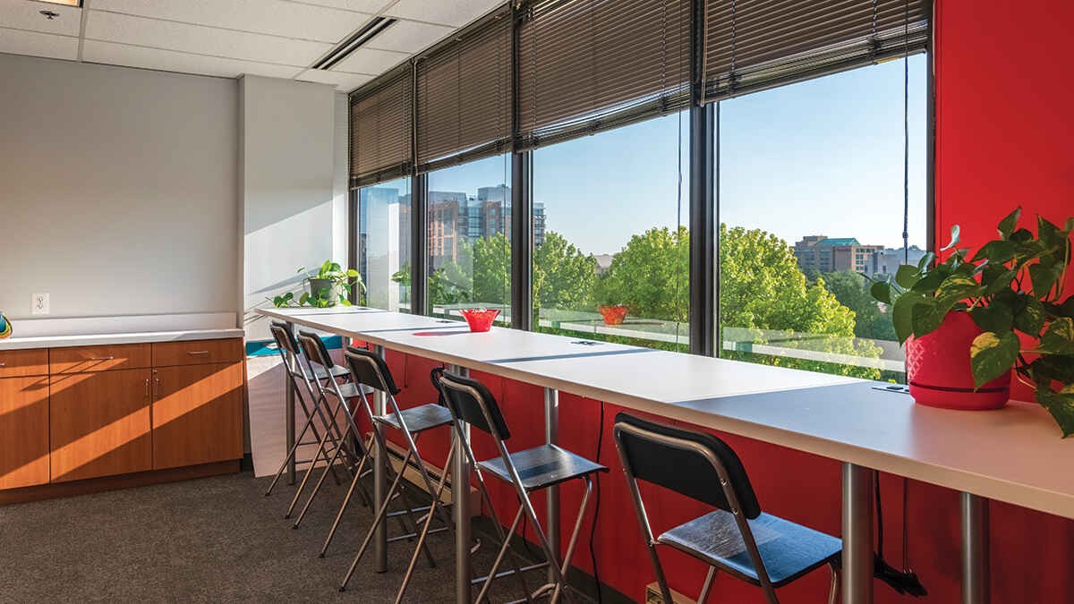 Picture of a beautiful view of high top seating in an office of JLL