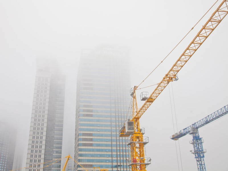 Construction crane to build commercial building