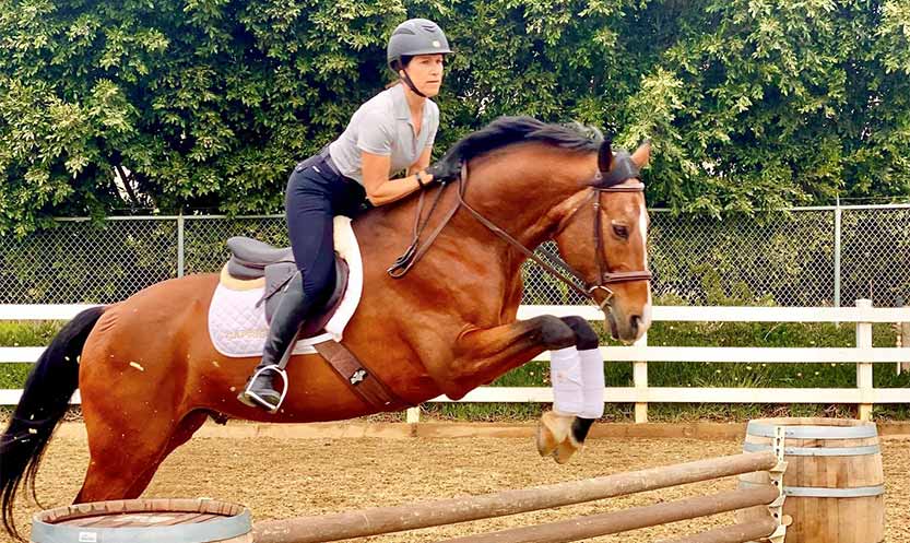 Kris Smith riding her horse, Caprice
