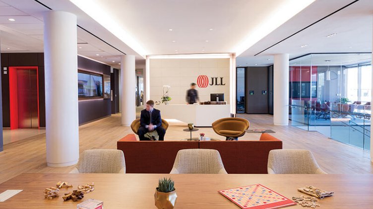 Man waiting for the interview in JLL reception area