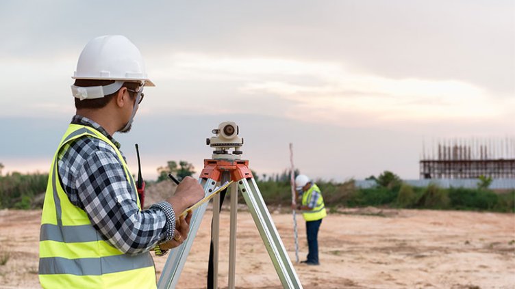 engineer taking measure of the land
