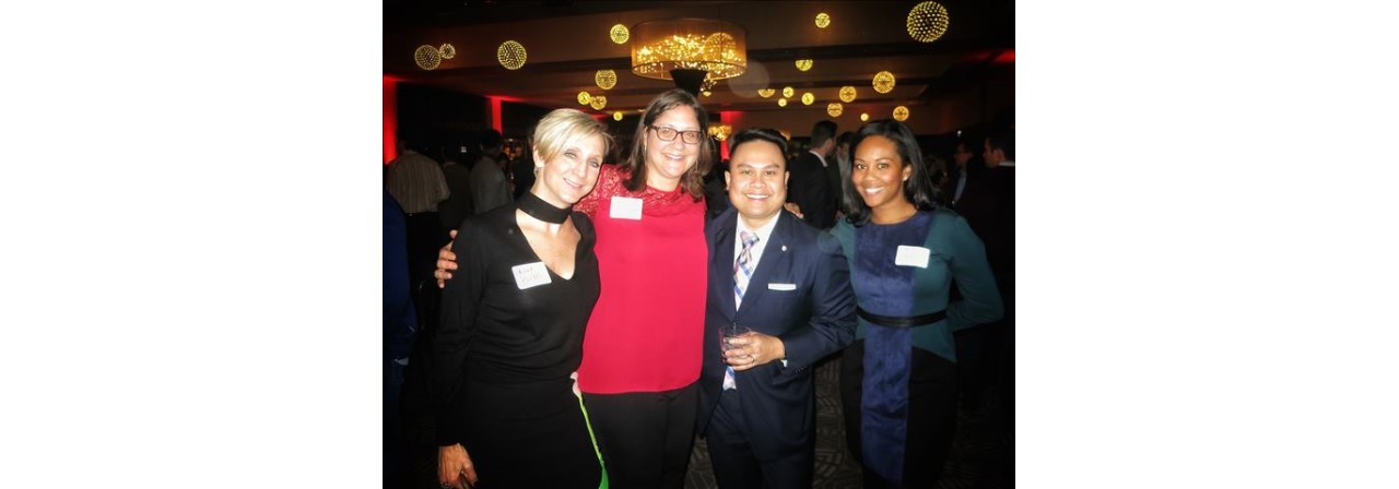 Donielle Watkins and three colleagues at an event